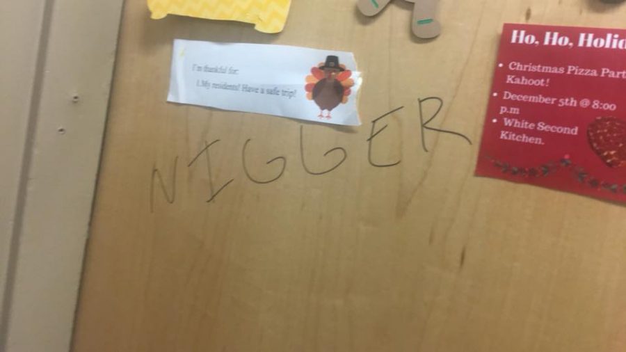 This image of the racist language written on the door of a Pierce White dorm room on Sunday night circulated on social media Monday. 