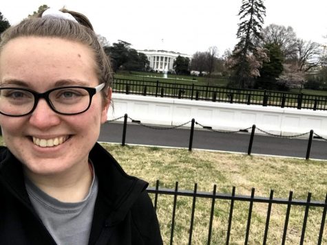 Olivia takes a selfie in front of the White House