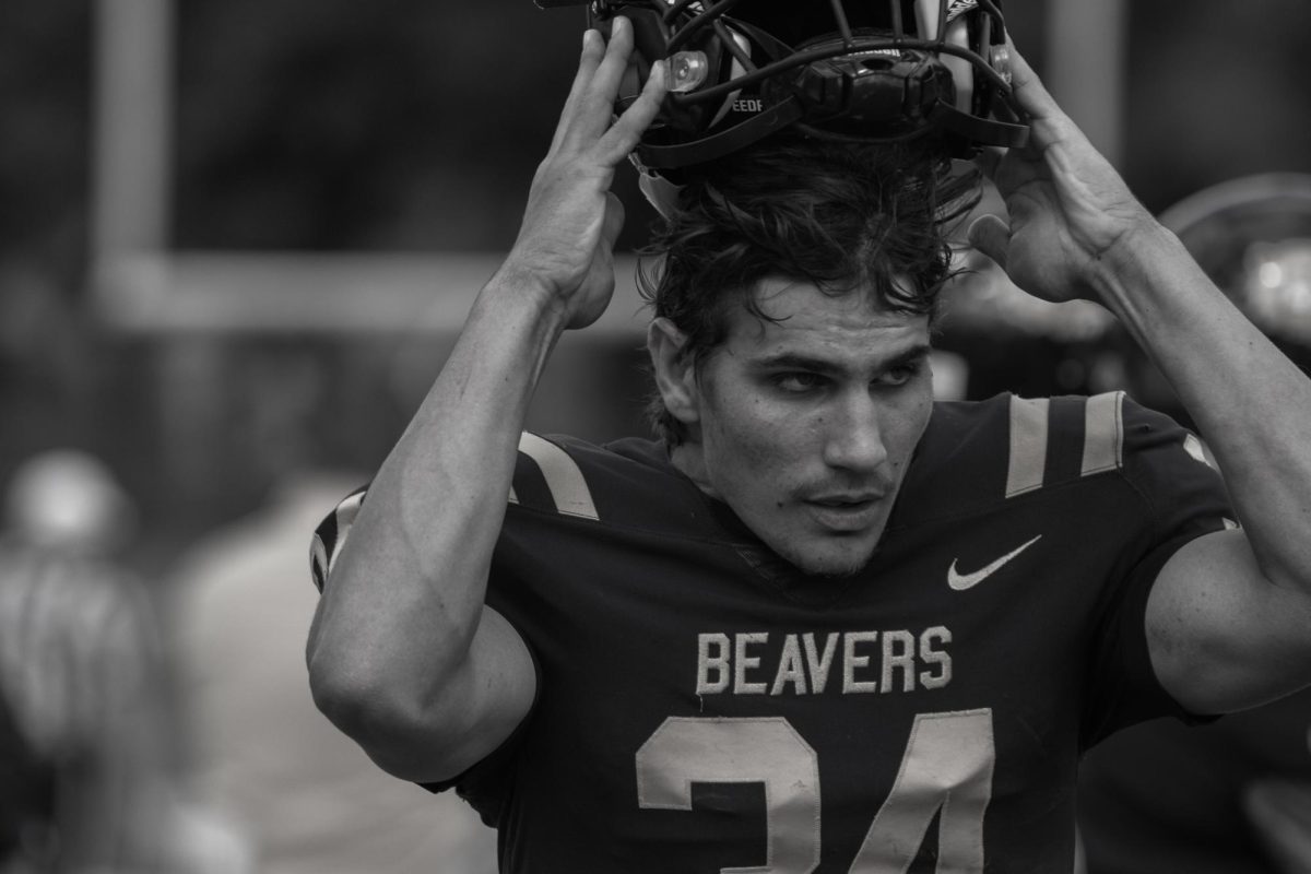 Nick Moorshead (34) on BVU’s home turf side lines walking away from the action of the field after Benedictine University scored a touchdown in the third quarter furthering the gap of 26-7 in the kickoff game to his senior season on September 7, 2024. 