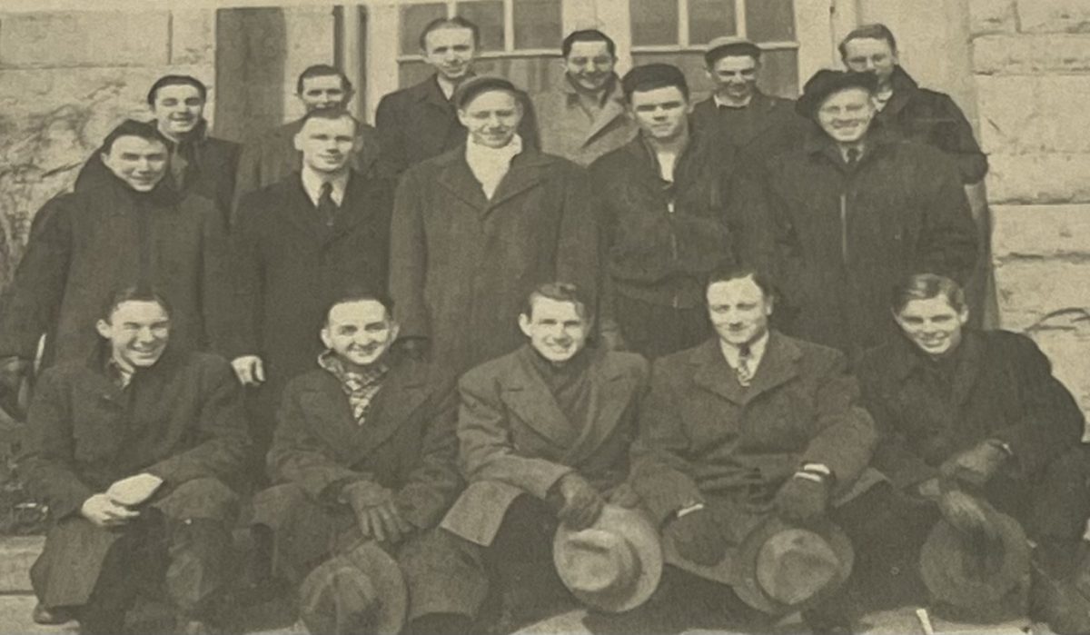 Phil Bertness (front right) in front of Old Main before shipping out in March 1943. Photo provided by Phoebe Feis.