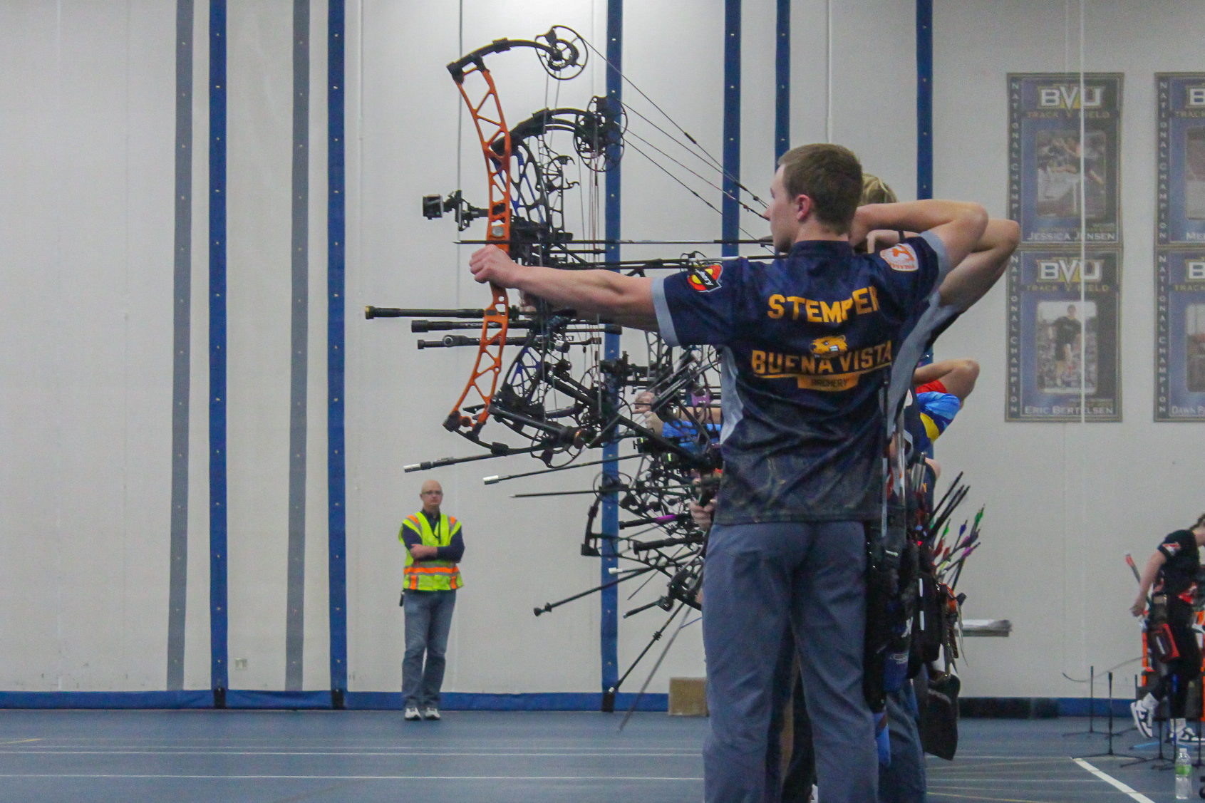 Sophomore Ethan Stemper stands at the end of the row as they take aim.